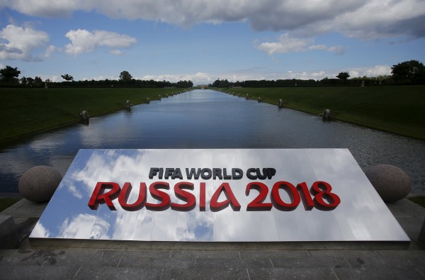 The 2018 World Cup logo is pictured near the Konstantin (Konstantinovsky) Palace, the venue of the preliminary draw for the 2018 World Cup, in St. Petersburg, July 24, 2015. The 2018 World Cup's preliminary draw will be held in St. Petersburg on July 25. REUTERS/Maxim Shemetov