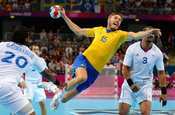 London Olympic Games - Day 16. Sweden's Jonas Larholm shoots at goal against France during the Gold medal match of the Men's Handball competition at the Copper Box Handball Arena, London. URN:14294284 (Press Association via AP Images)